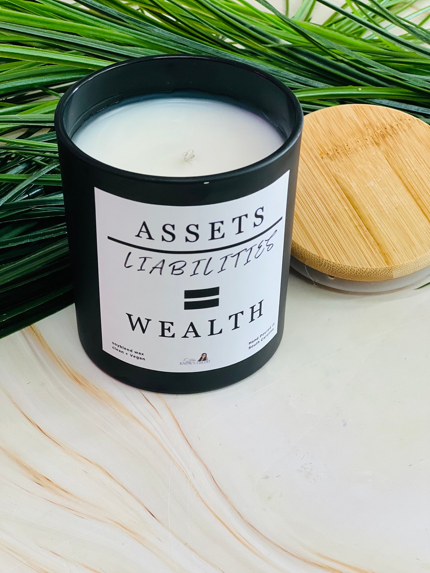 Assets Over Liabilities Equals Wealth Candle